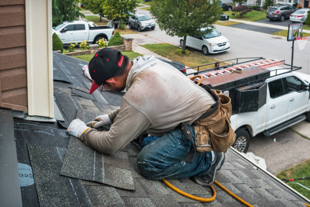 Professional Storm Damage Roof Repair technician working in New Berlinville, PA